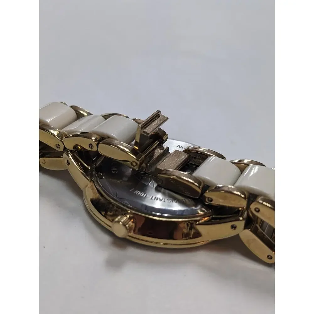 Anne Klein Two Tone White and Golden Sectioned Wrist Watch Roman Numeral